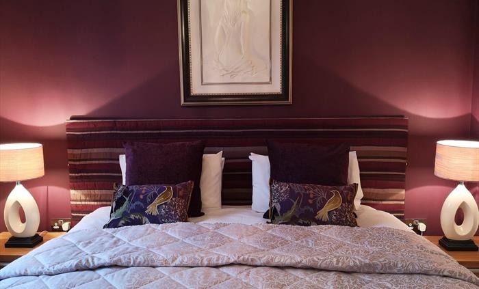 Large bedroom on the 1st floor overlooking the grounds and Brechfa Forest. Luxury super king size bed which can be changed to twin beds. Ensuite showe